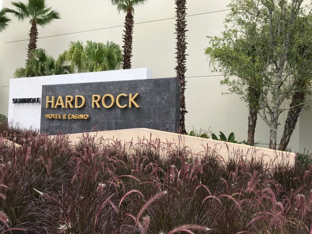 Hard Rock Tampa Entry Signage Color Charcoal, White and Villa M