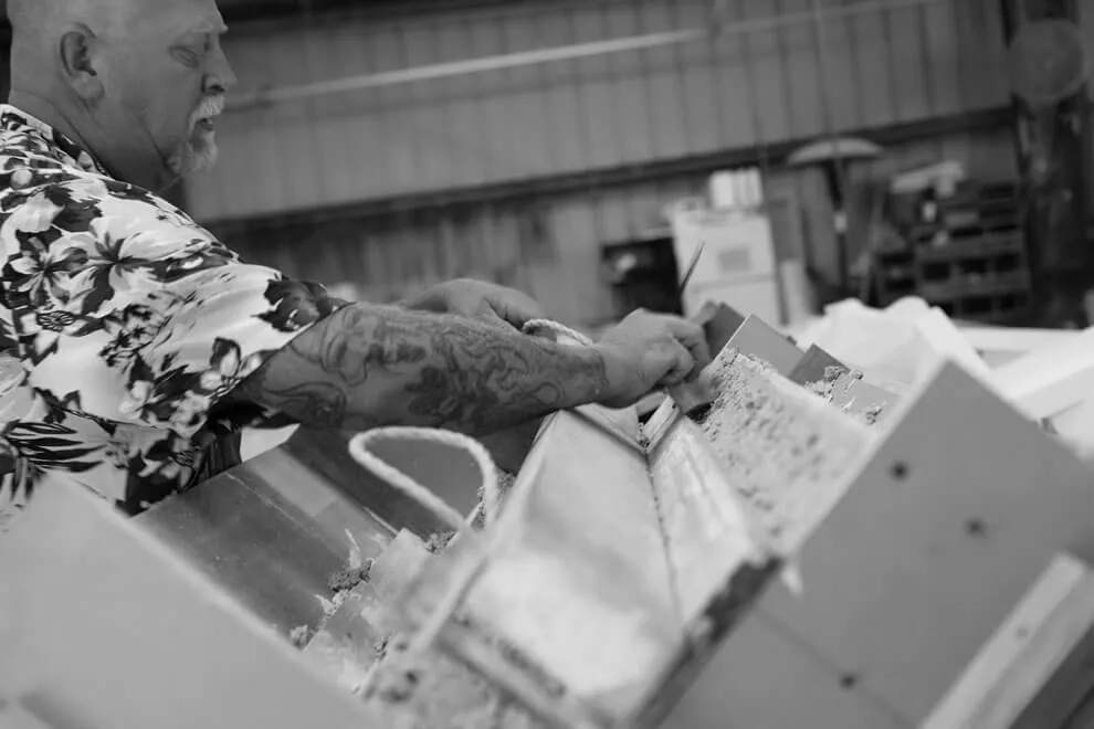 Carpenter Working on L-shape Piece