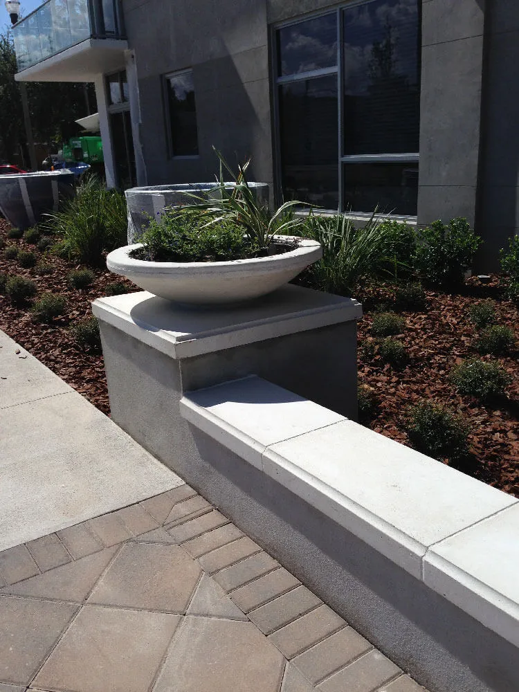Hermitage St. Pete Wall Coping and Planter